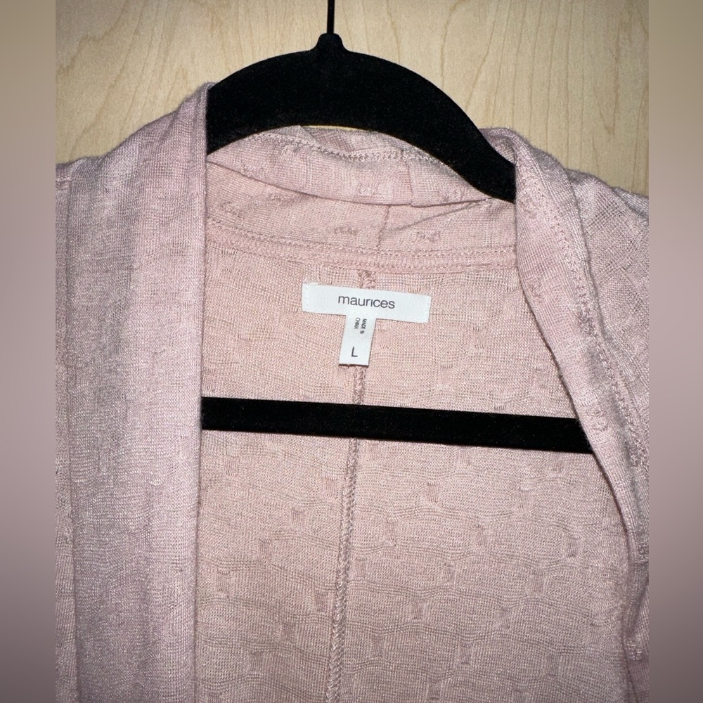 Woman’s poke a dot pink cardigan